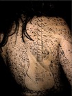 Picture for song 'TATUAJE' by artist 'nirmanakaya'
