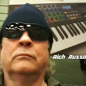 Picture for song 'World Turning Around ~ Russom/Aloisa' by artist 'RICH RUSSOM'