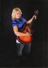 Picture for song 'Kickin' Up Dust' by artist 'McKenzie Wilson'